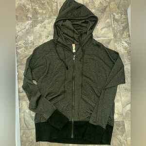 Lucy Women Dark Gray Zip-Up hooded jacket.
